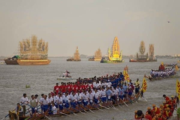 Huge boats line the riverside at the Bon Om Touk festival every year.