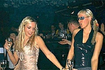 Party girls at an Ibiza club. Party girls at an Ibiza club. Drugs and late night raves are a big part of the party scene in Ibiza.