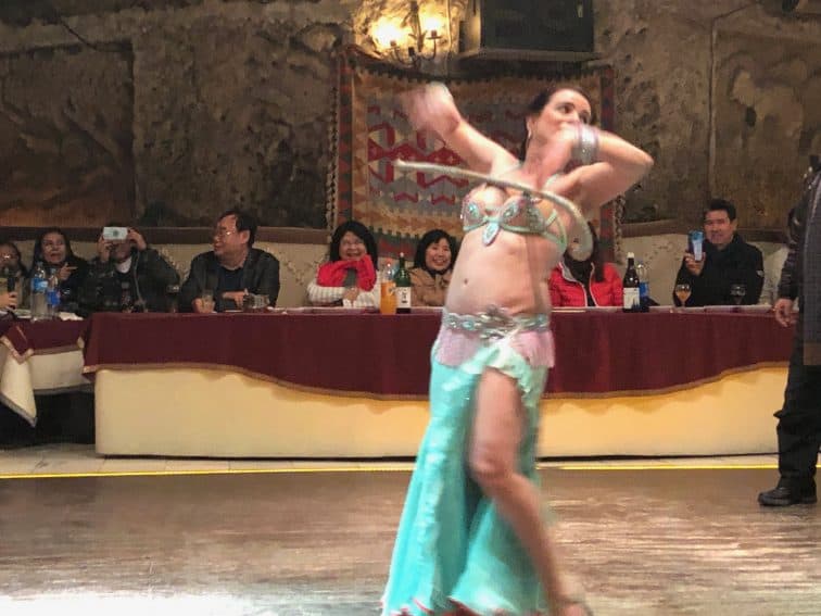 A belly dancer entertains diners at a cave restaurant in Cappadocia.