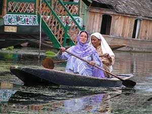 Boaters on Lake Dal - David Rich writes, 'Babes Do Boat.'