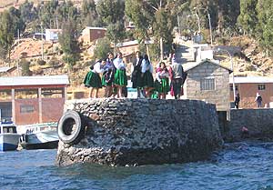 Aymara women on the dock on Amantani Island