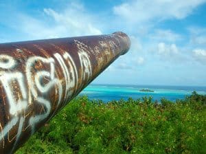 A graffiti-covered gun is a reminder of the U.S. Army's occupation of Bora Bora during WWII. Photos by Nancy Smay