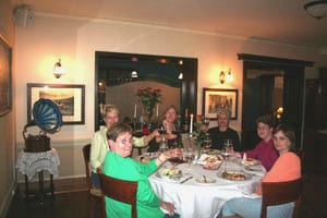 At dinner, the small groups often form strong bonds on trips.