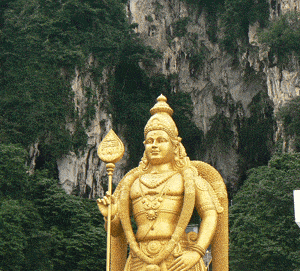 The Hindu god Murugan greets visitors at the Batu Caves, outside of Kuala Lumpur, Malaysia