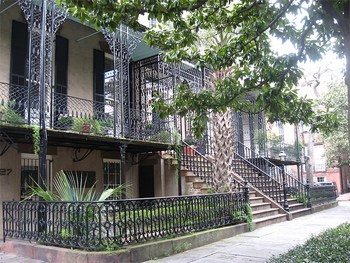 Wrought iron railings surround this typical house in Savannah. photos by Megan Pasche.