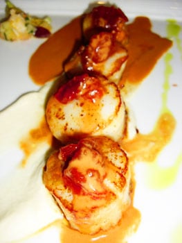 The delicious scallops at Umami Moto, a restaurant that combines French and Asian cuisine