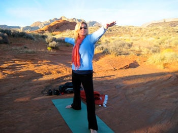 Yoga in Snow Canyon at sunset is just one of the many outdoor recreational activities that Red Mountain Resort has to offer.