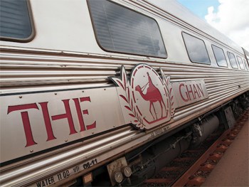 The side of the famous Ghan Railway with its distinct 'camel and handler' logo. 