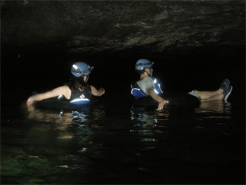 Floating deep inside Crystal Cave, Belize.