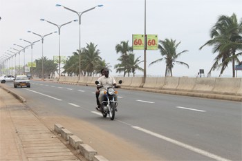 Motorcycle taxi in Lomé, Togo. Photos by Raquel Fletcher.