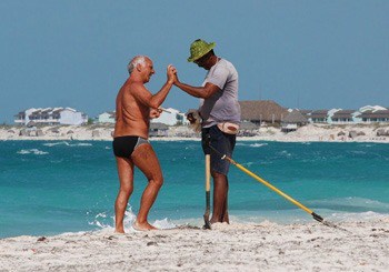 Tourist and Cuban worker connecting