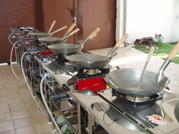 Thai cooking woks, ready for action.