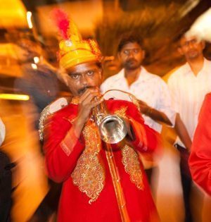 A wedding band playing on one of the trains in India.