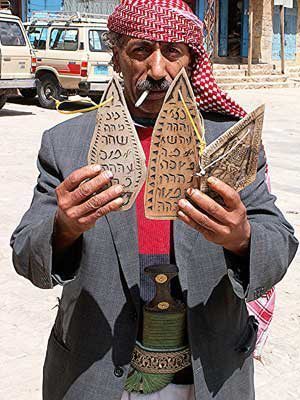 A Yemeni man sells cards.