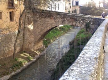 Bridge over Guadalquivir leading to Cordoba's Old Town in Andalusia, Spain