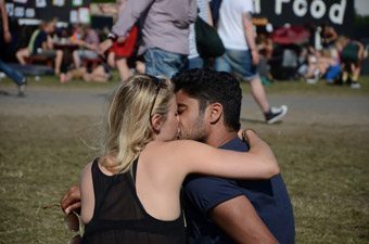 Sharing a kiss at the Roskilde Music Festival in Denmark. Connie Westergaard photos.