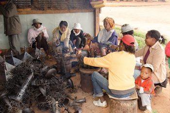 Families sculpt high quality products from battered oil drums. photo by Chris Beynon.