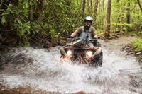 Bluff Mountain ATVs, fording a stream.