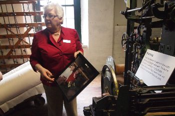 Rachel from the LA Museum shows us the machine her father once worked on in Lewiston Maine.