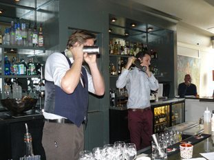 Joel Finsel and Ian Murray, the bartenders at Manna, demonstrate the fine points of mixology.