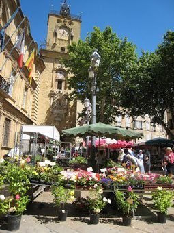 Aix’s flower market in Place de l’Hotel de Ville, with the 16th-century clock tower in the background.
