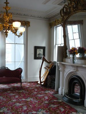 Susan Wilzer plays that harp at the Bellamy Mansion in Wilmington.