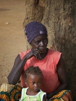 Granny and baby waiting for vaccinations in the Central African Republic. Searching for megaliths.
