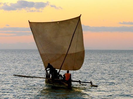 An outrigger canoe off the coast of Madagascar. photos by Jean M. Spoljaric.