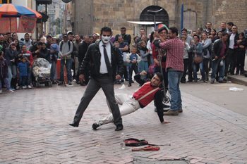 Street clowns are a part of Bogota's charm, these comics were performing outside of the Gold Museum. Photo by Max Hartshorne.