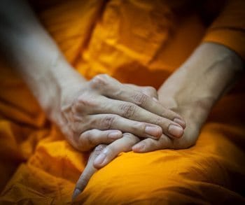 Another monk's hands in Thailand. Paul Shoul photo.