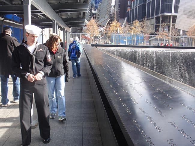 People searching for names on the 9/11 memorial in lower Manhattan.