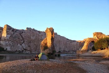 Waking up on the banks of the Tigris River, beneath the 11,000 year old inhabitations at Hasankeyf.