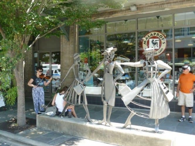 Street performers and sculptures in downtown Asheville, North Carolina