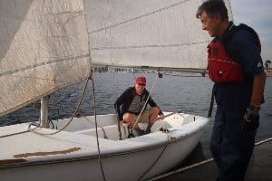 Cesar Jara rigs up our sailboat in Marina del Rey.