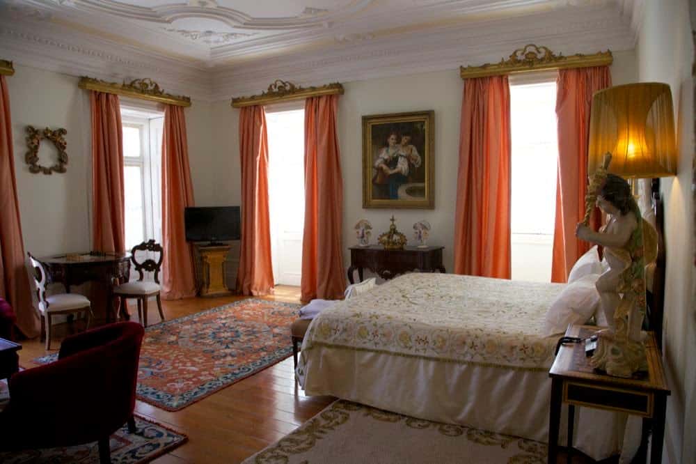 A sumptous room filled with antiques at Hotel Casa da Insua in Vizeu, Portugal.