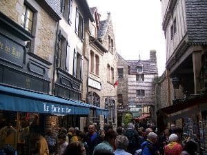 Inside Mont St Michel, a maze of shops and stone pathways leading to the top.