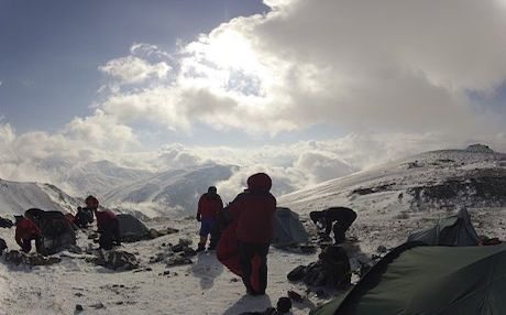 Members of the Secret Compass team trek to the summit in Iraqi Kurdistan Mountains