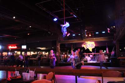 Line dancers dancing beneath a disco saddle. Stephanie DiCarlo photos.