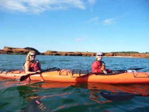 Sea kayaking in Pleasure Bay, Magdalen Islands.