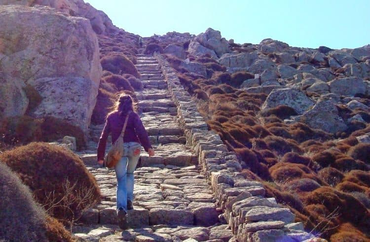 Climbing the stairs to the top of Mt. Kynthos.