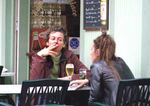 Smokers are easy to find in French cafes.
