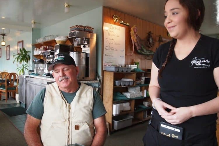 Mark Tognazzini of Dockside Restaurant with an employee.