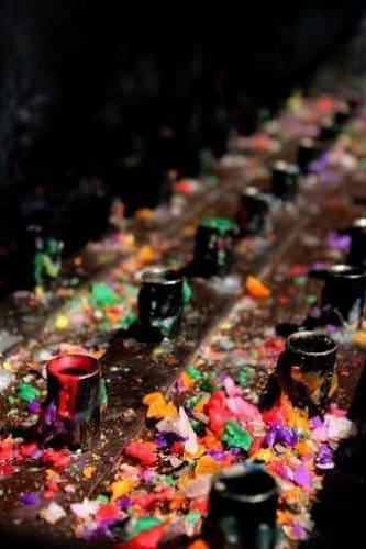 Prayer candles at a market in Lima, Peru.