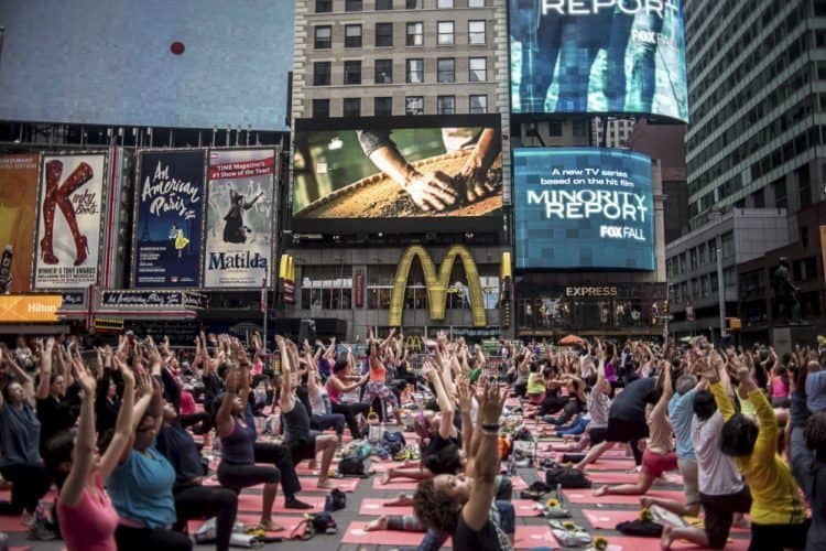 Yogis participate in the Solstice event in Times Square