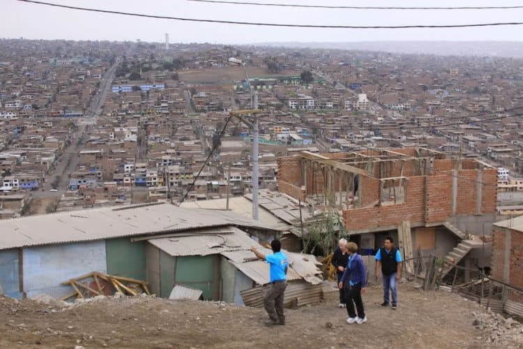 Touring above the city Lima Peru shanty towns.