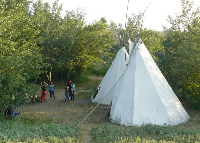 Tipis near the "buffalo jump" at the Wanuskewin Heritage Park.