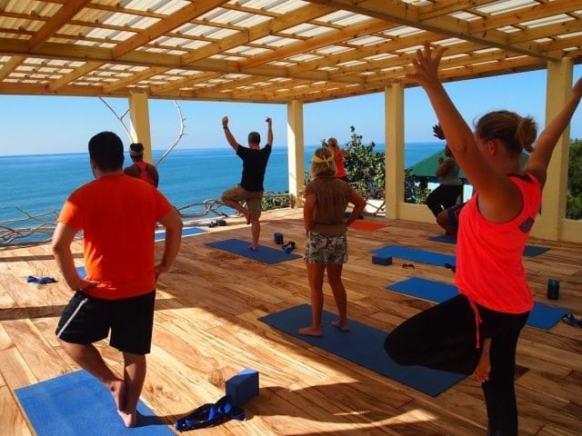 Yoga on the beachfront on the South Coast.