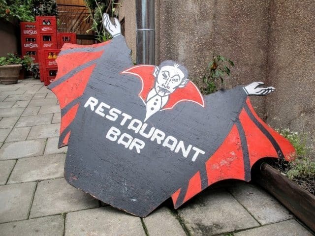 Though Dracula is an entirely fictional character imagined by an author who never set foot in Transylvania, the name and image are used for marketing everywhere in the region. This sign greets visitors to an outdoor cafe in Sighisoara.