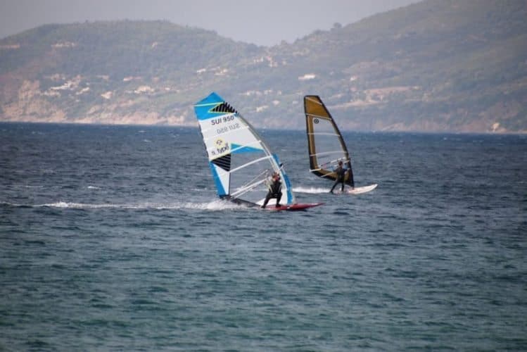 Windsurfers enjoy the strong winds of the double Tombolo, a two-headed peninsula off Hyeres, France.