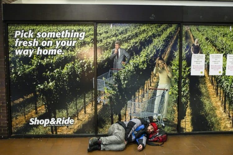 A homeless man sleeps inside the Port Authority.